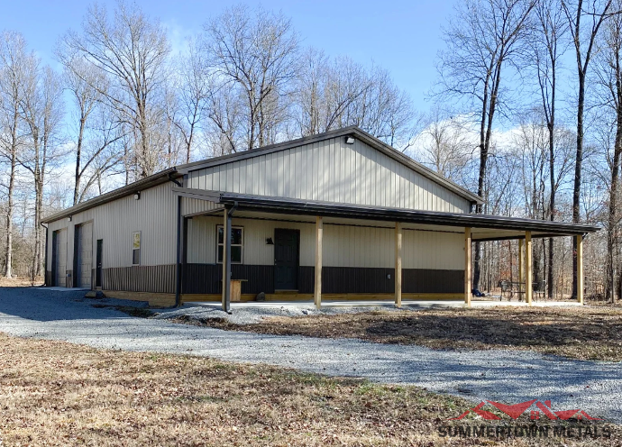 40x70x12 shop with taupe siding, dark roof and accents, and wood poles